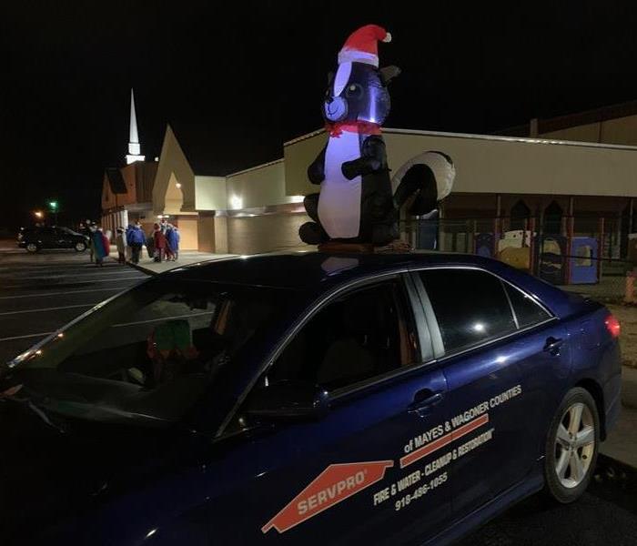 Our SERVPRO car with Lilly our mascot ready to go in the Pryor Christmas Parade. 